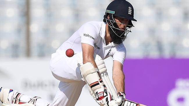 England's Moeen Ali plays a shot during the first day of the first Test match between Bangladesh and England.
