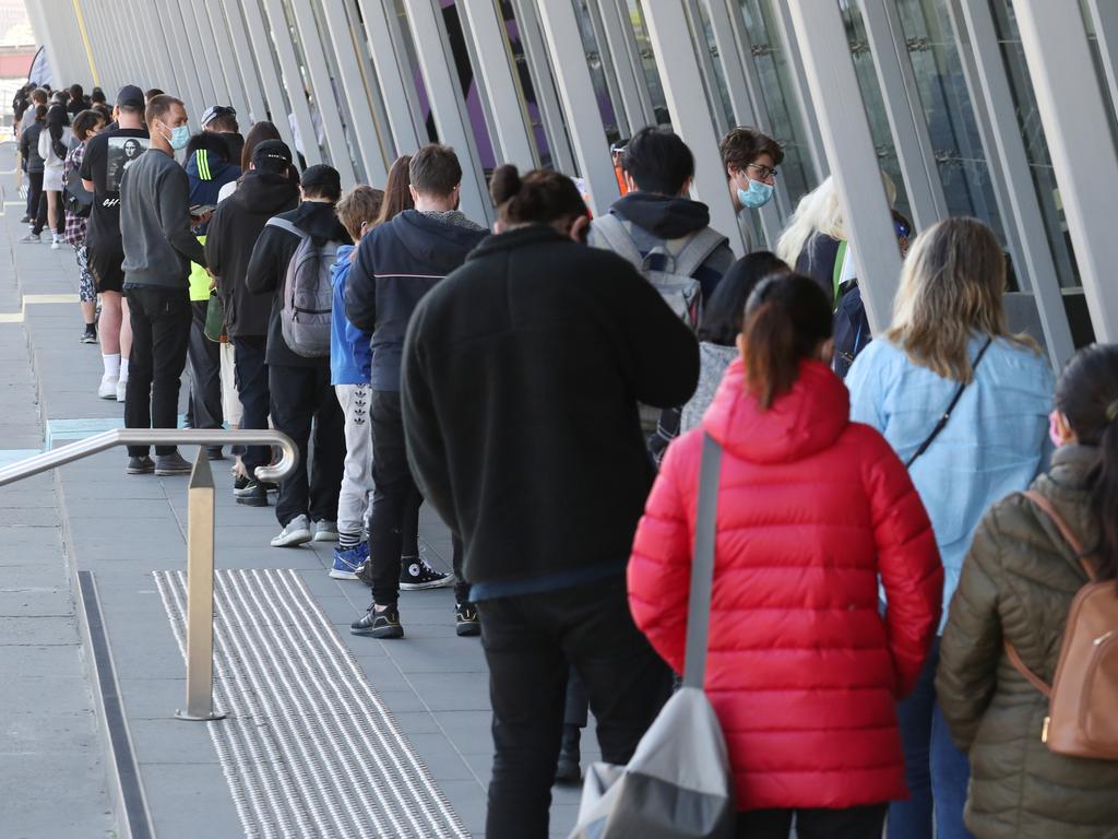 People line up at a Covid vaccine hub in Melbourne. Picture: David Crosling/NCA NewsWire