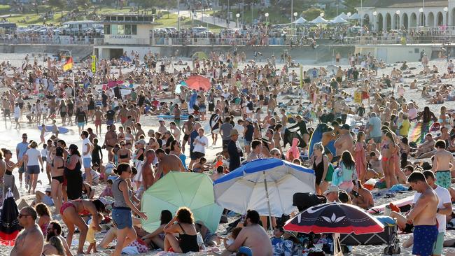 Beachgoers at Bondi on Friday, despite the threat of coronavirus and social distancing measures.