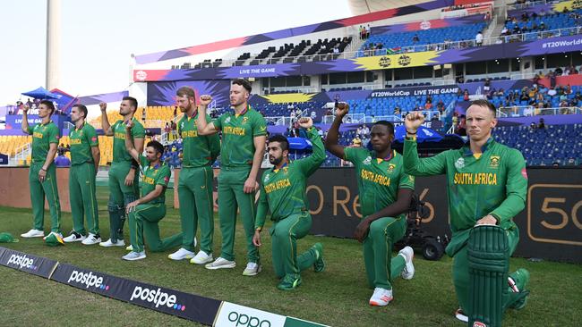 Some South African players take the knee ahead of the ICC Men's T20 World Cup match between Australia and SA at Sheikh Zayed stadium on Saturday. Picture: Getty Images