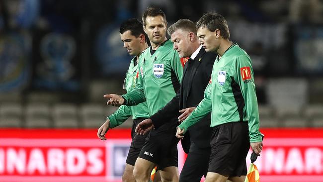 Phoenix manager Ufuk Talay speaks with the referees during Friday’s tough defeat. Picture: Getty