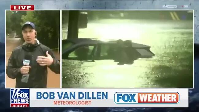 Weather reporter rescues woman from flooding live