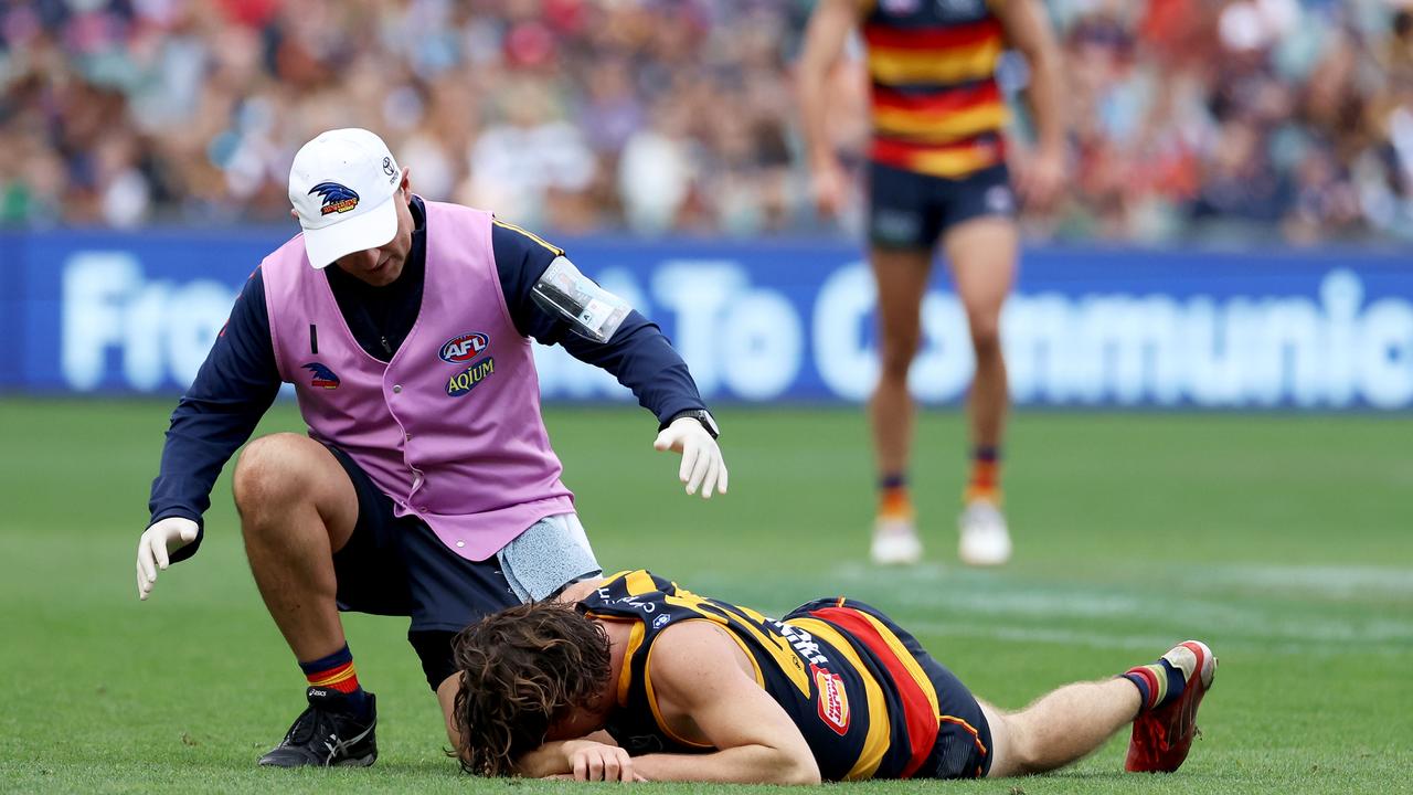 McHenry after copping the knock. (Photo by James Elsby/AFL Photos via Getty Images)