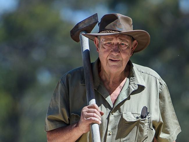 Marcus Taylor is 77 and lives in  Natte Yallock (near Maryborough). He letterbox dropped all the farms within a 30km radius of his home recently looking for work, he's that keen to stay actively employed. He says he might be in his late 70s but "fit as a fiddle"  and can work all day,  "12 hour days are not a problem". He says "if you're fit, you should be working". Reckons he can work today's young folk into the ground and there's not much he won't do for a quid. If he'd known about the VFF's farms employment matching program back in June (which had less than 10 takers), he would have signed up.He's happy to pose up in a paddock, on a hay bale or chopping wood (which he does now for money) etc Picture: Jay Town