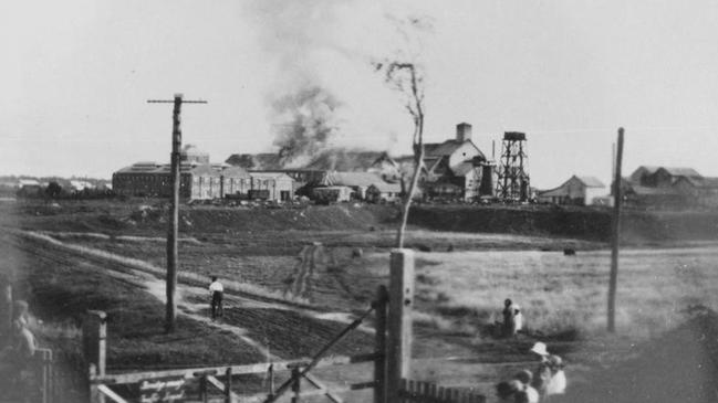 Fire at the Bundaberg Distillery, 1936. The dramatic event attracted onlookers to witness the destruction. Source: John Oxley Library, State Library of Queensland