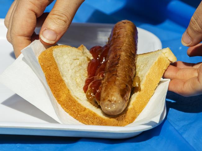 SYDNEY, AUSTRALIA - NewsWire Photos OCTOBER 11, 2020: A sausage sandwich is seen at Bunnings Alexandria where itÃs sausage sizzle has resumed after COVID-19 restrictions. Picture: NCA NewsWire / Jenny Evans