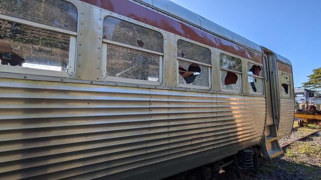 Operators of the Savannahlander were gutted when their accessibility carriage was pummelled with rocks, smashing all its windows and leaving the interior strewn with glass. Photo: Facebook