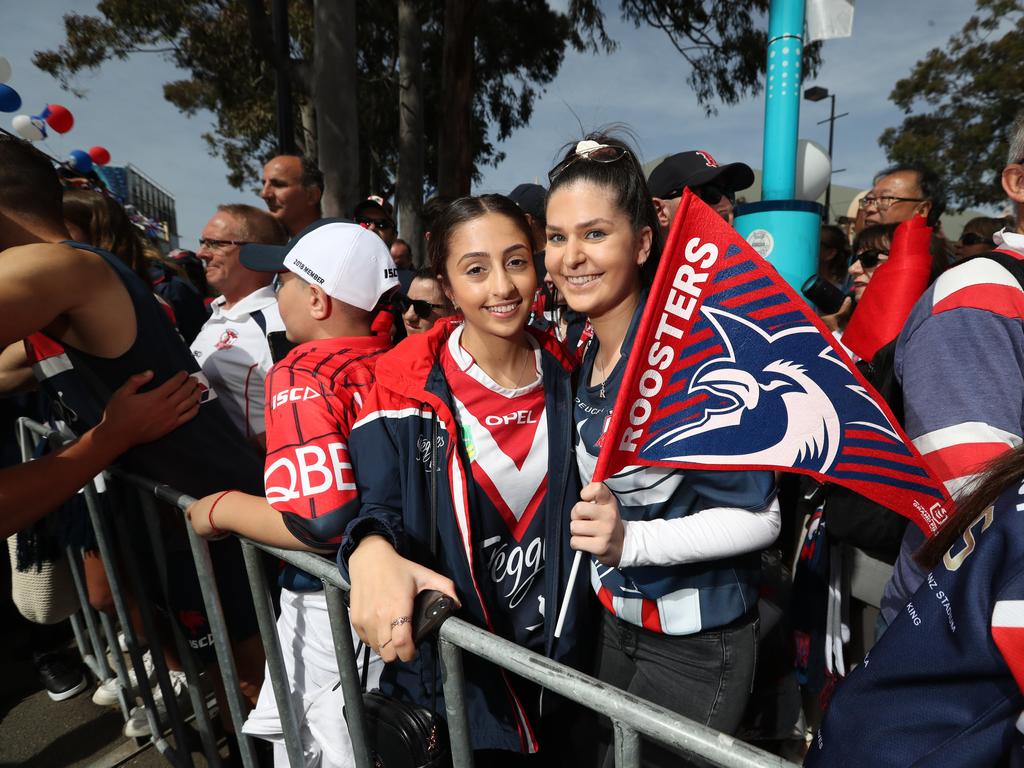 Roosters fans Caroline Manookian and Rebecca Warian pictured at the Sydney Roosters fan morning at Moore Park after the Roosters win in the 2019 NRL Grand Final. Picture: Richard Dobson