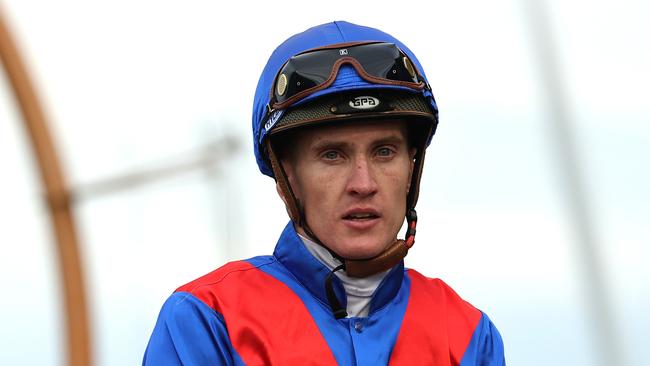 SYDNEY, AUSTRALIA - JUNE 29: Chad Schofield riding Golden Path wins Race 7 Toyota Forklifts W J McKell Cup during "McKell Cup Day" - Sydney Racing at Rosehill Gardens on June 29, 2024 in Sydney, Australia. (Photo by Jeremy Ng/Getty Images)