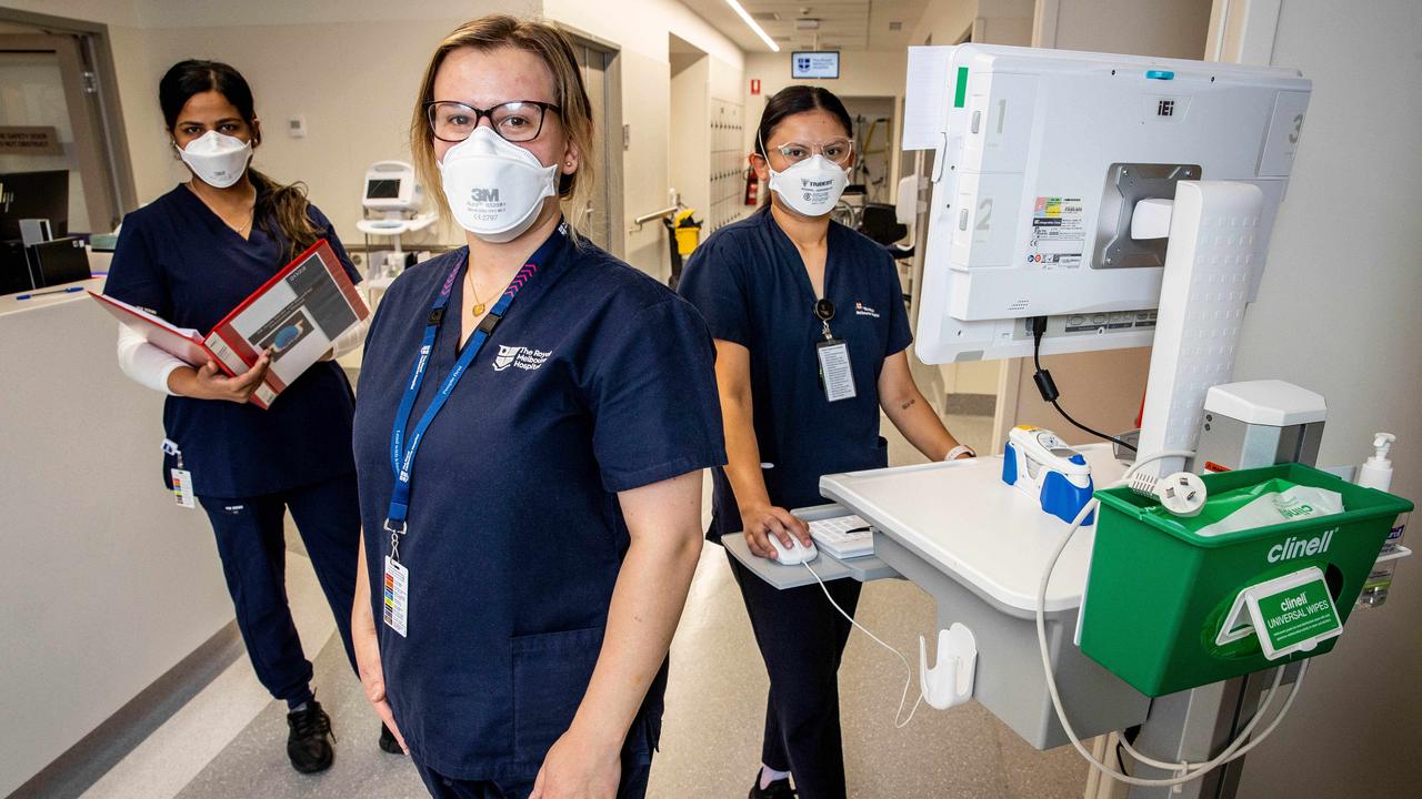 Royal Melbourne Hospital nurses Dikchhin Regmi, Grace Cooper and Melissa Cini. Picture: Jake Nowakowski