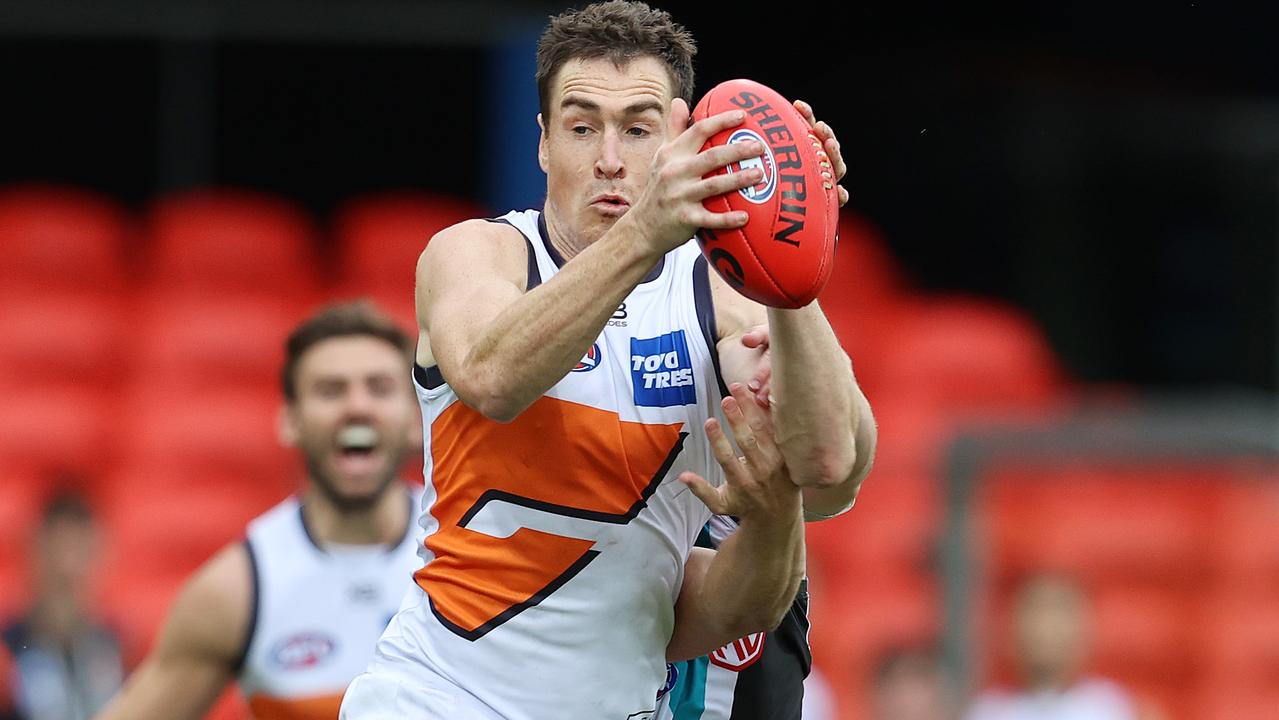 Jeremy Cameron of the Giants wins the contested footy. Picture: Michael Klein