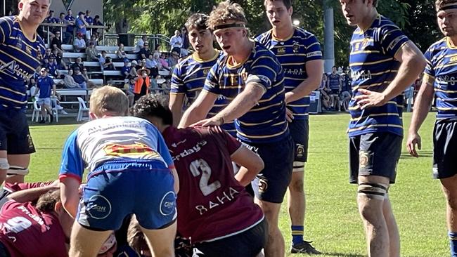 Easts go close to scoring a try against University.