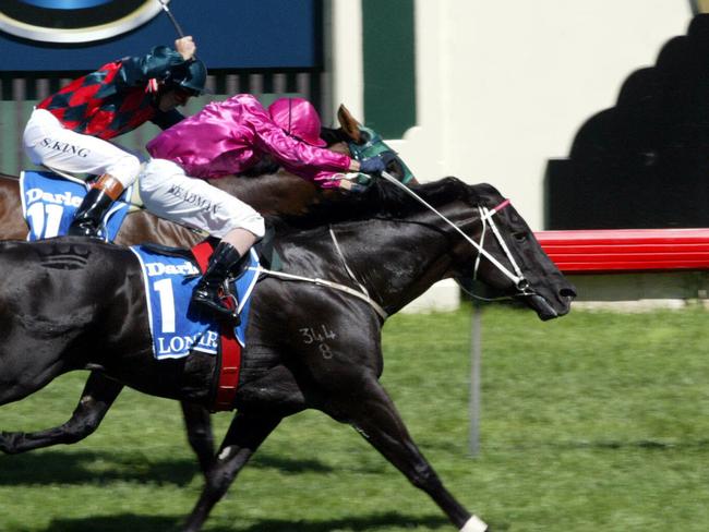 MARCH 8, 2004: Racehorse Lonhro (outside) ridden by jockey Darren Beadman winning race 6, Australian Cup at Flemington in Melbourne, 08/03/04. Pic Nicole Garmston.Turf A/CT