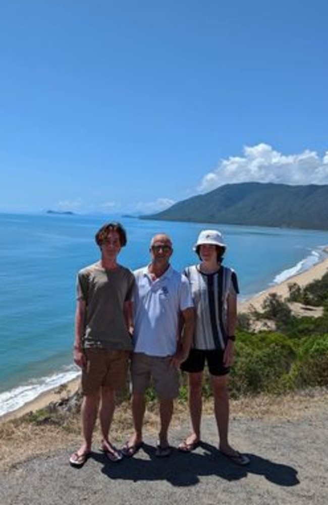 Armstrong Beach father Julian Jenner with his sons, Nathan (far left) and Ryan (far right) visiting the Cairns region. Picture: Contributed