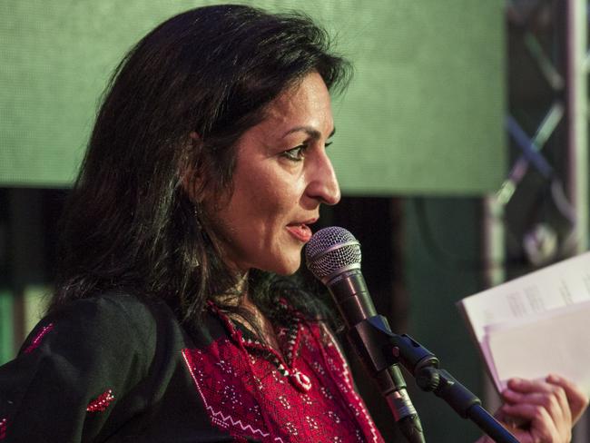 BEIT WAZAN, WEST BANK - JUNE 4:   Susan Abulhawa, a Palestinian-American writer and human rights activist,  speaks at a 2014 Palestine Festival of Literature event at Qasr al Qassem on June 4, 2014 in Beit Wazan, near Nablus, West Bank. The festival is an annual event that aims to bring a cultural festival of international standard to audiences in Palestine to assert "the power of culture over the culture of power."  (Photo by Rob Stothard/Getty Images)