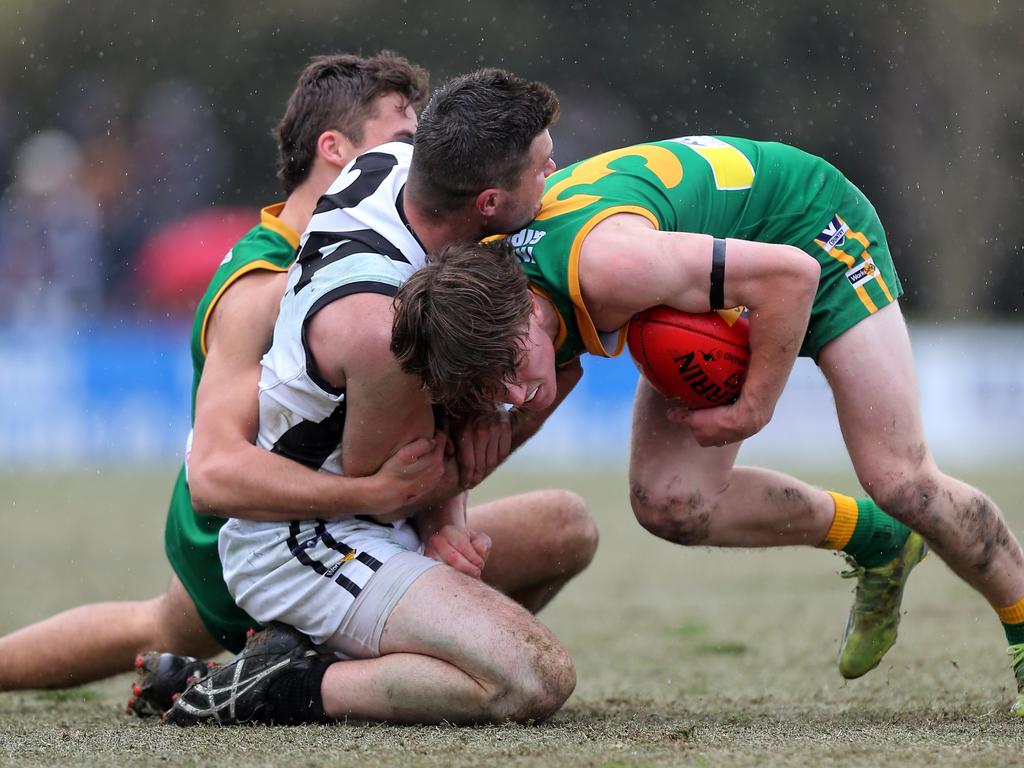 Hanily with his head over the ball while playing for the Leongatha Parrots. Picture: Yuri Kouzmin