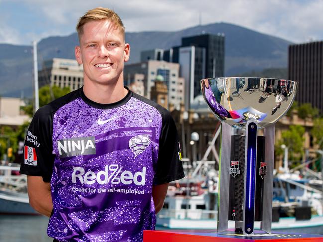 Hobart Hurricanes captain Nathan Ellis with the BBL trophy in Hobart. Picture: Linda Higginson