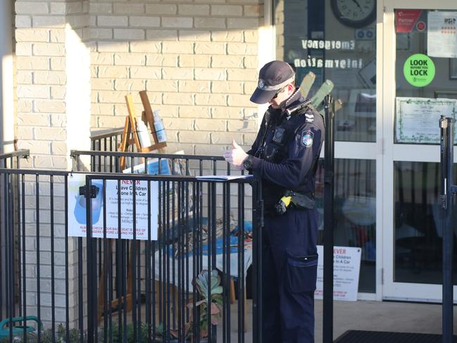 Police at the childcare centre in Gracemere where a child was found in critical condition on a parked bus, Gracemere - Photo Steve Vit