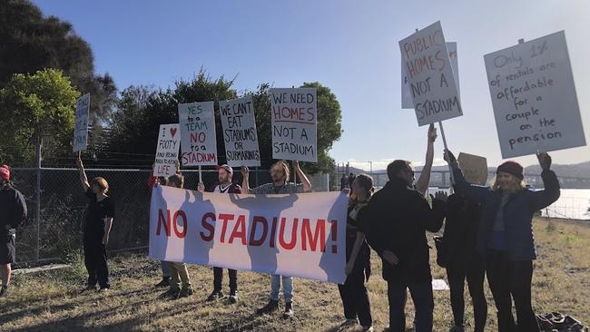 Anti-stadium protesters have heckled Prime Minister Anthony Albanese as he announced $240m in funding towards the redevelopment of Macquarie Point in Hobart.