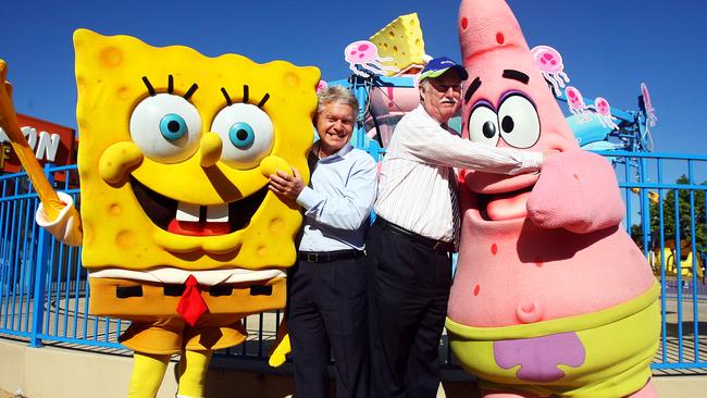 Flashback: Gold Coast Tourism CEO, Martin Winter with SpongeBob SquarePants and Tourism Minister Peter Lawlor at Dreamworld.