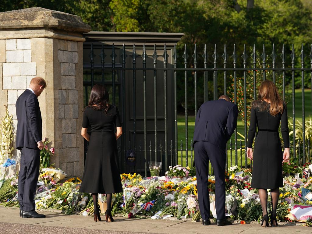 The four read condolence messages left in tribute to the Queen. Picture: Getty Images.