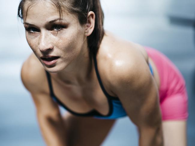 Young woman resting after workout