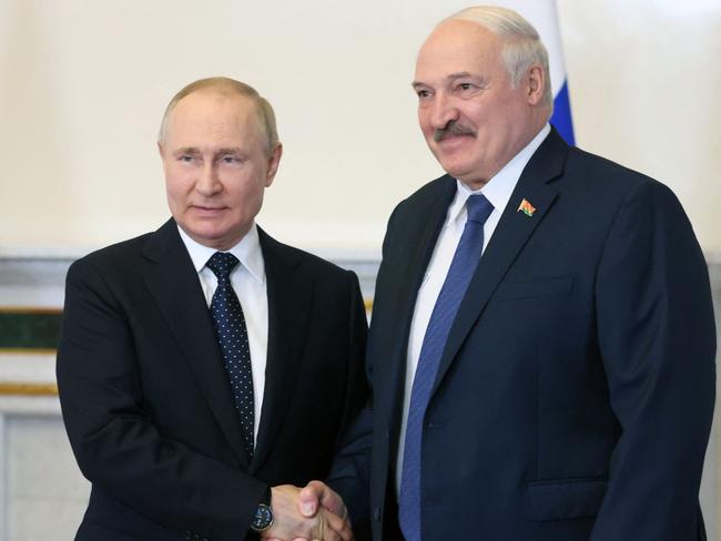 Russian President Vladimir Putin and his Belarusian counterpart Alexander Lukashenko during a meeting in Saint Petersburg. Picture: Mikhail Metzel / SPUTNIK / AFP