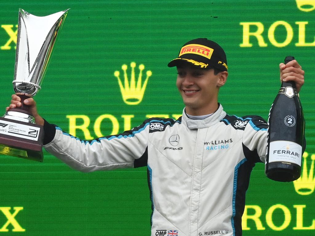 George Russell celebrates his maiden F1 podium.