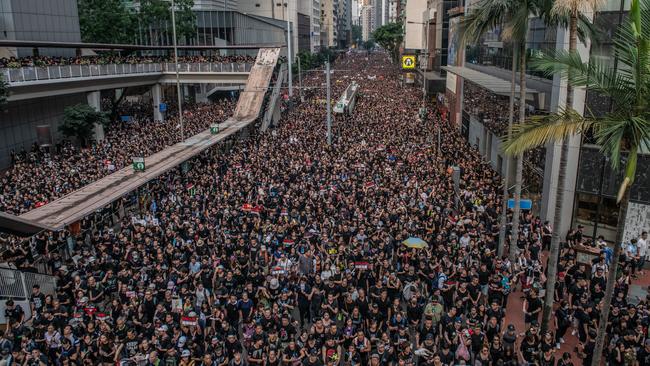 Protesters demonstrate against the now-suspended extradition bill yesterday.