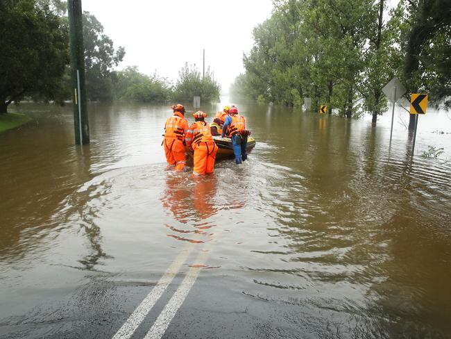 State Emergency Service workers launch their rescue craft into the flooded Hawkesbury River. Picture: Getty Images