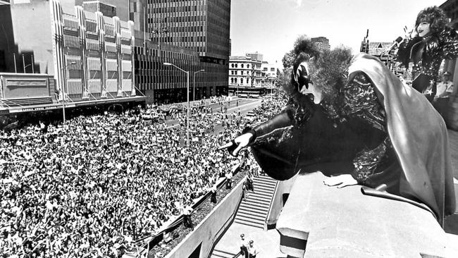 Gene Simmons and Paul Stanley of KISS holding court on the balcony of Sydney Town Hall, November, 1980. Picture: Barry McKinnon