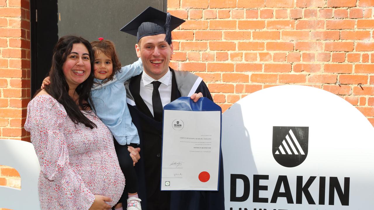 Deakin University graduate Jarryd Akaaruru-Snelling with wife Jessica and daughter and Marley, 2. Picture: Alison Wynd