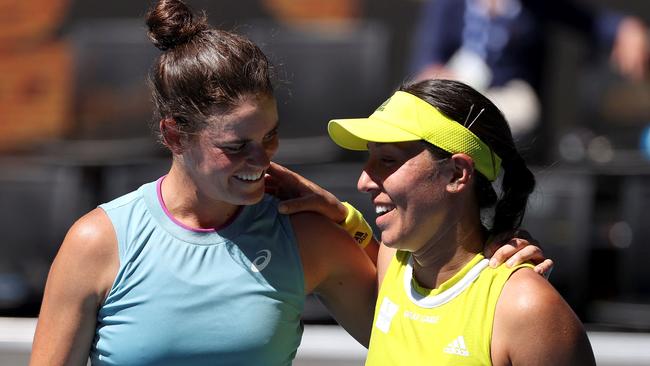 Jennifer Brady and Jessica Pegula embrace after their all-American quarter-final.