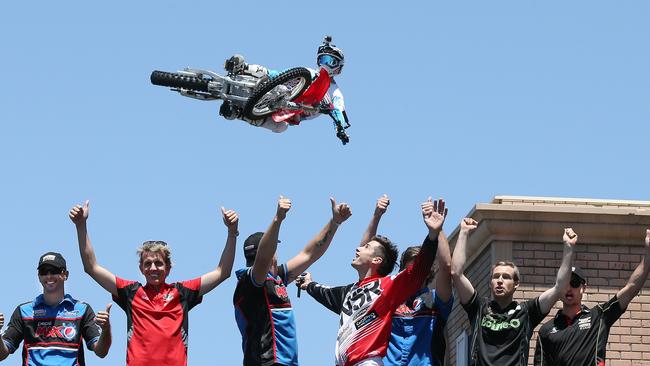 V8 Supercar drivers join Movie World Hollywood Stunt Driver 2 Show at Movie World on the Gold Coast. Left to right the drivers are, Steve Owen, Warren Luff,Paul Morris, Rick Kelly, Chaz Mostert , David Reynolds, and Tim Slade. Picture Glenn Hampson