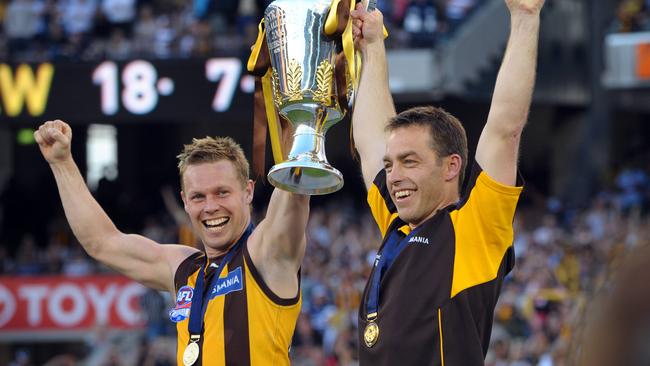 Sam Mitchell and Alastair Clarkson.