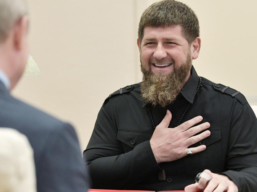 Ramzan Kadyrov smiling as he speaks with Russian President Vladimir Putin at the Novo-Ogaryovo state residence outside Moscow. Picture: Alexey NIKOLSKY / SPUTNIK / AFP