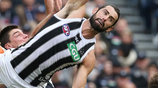 AFL Round 8. Carlton v Collingwood at the MCG. 10/05/2019.  Collingwood's Brodie Grundy  wins the centre bounce battle   .  Pic: Michael Klein.