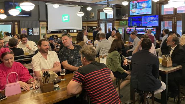 Drinkers at Sydney's The Edinburgh Castle await the start of the Melbourne Cup.