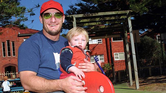 Ben Walker with his son Sam in 2003. Picture: Katrina Woodward