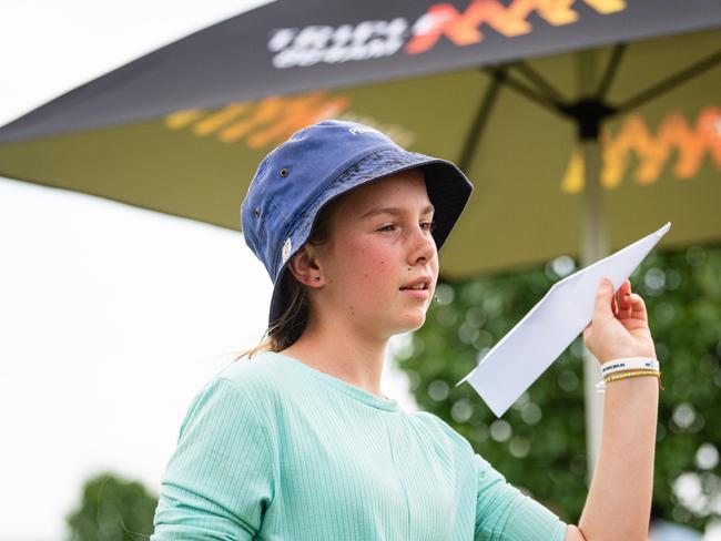 Alexis Black flying a paper plane at Wellcamp Airport 10th anniversary community day, Sunday, November 10, 2024. Picture: Kevin Farmer