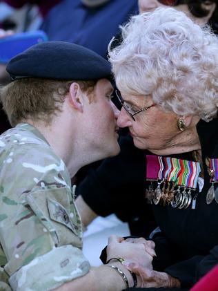 Prince Harry goes in for a kiss from Daphne. Picture: Gregg Porteous