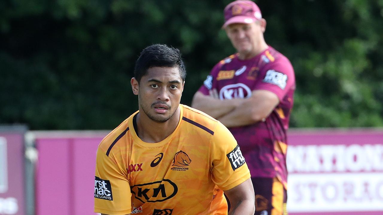 Coach Kevin Walters takes a closer look at Anthony Milford, Brisbane Broncos training, Red Hill. Photographer: Liam Kidston