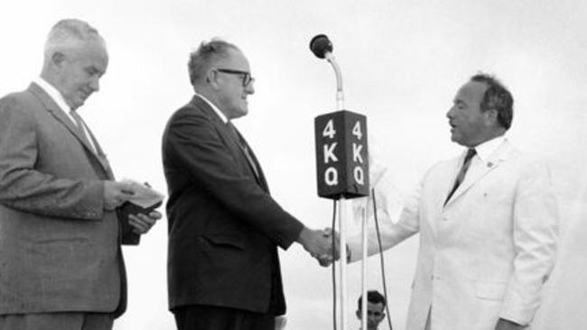 Alderman Len Peak (far left) and Mayor Ern Harley (centre) congratulate developer Stanley Korman (Right) at the opening ceremony of the bridge to Chevron Island, Gold Coast, March 12, 1960. Supplied by Gold Coast City Council Local Studies Library.