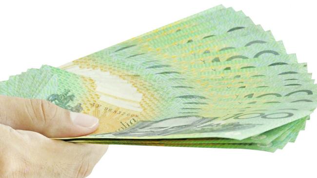 Hand holding money - Australian dollars Donation generic Handout Bribe Political donation Picture: Supplied