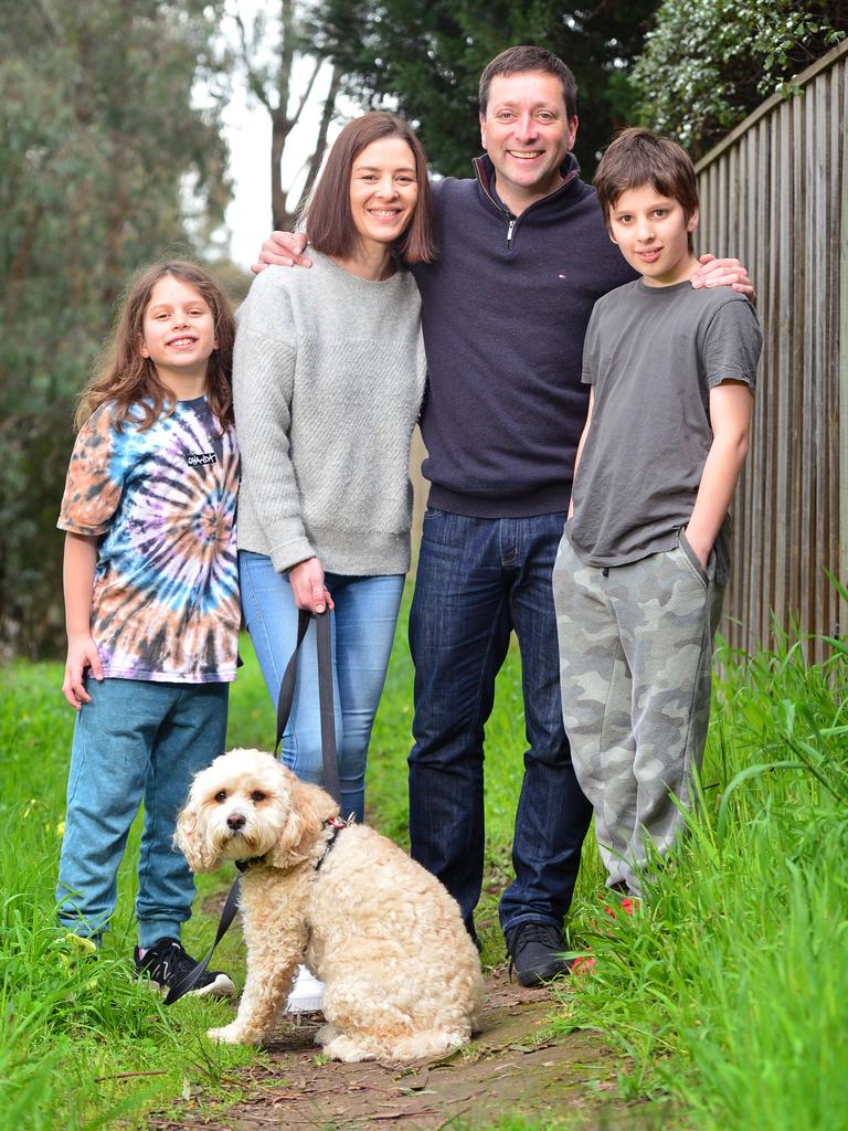 Matt Guy, with wife Renae and two of his three sons, Alex, 9, and Sam, 11, with dog Wally. Picture: Nicki Connolly