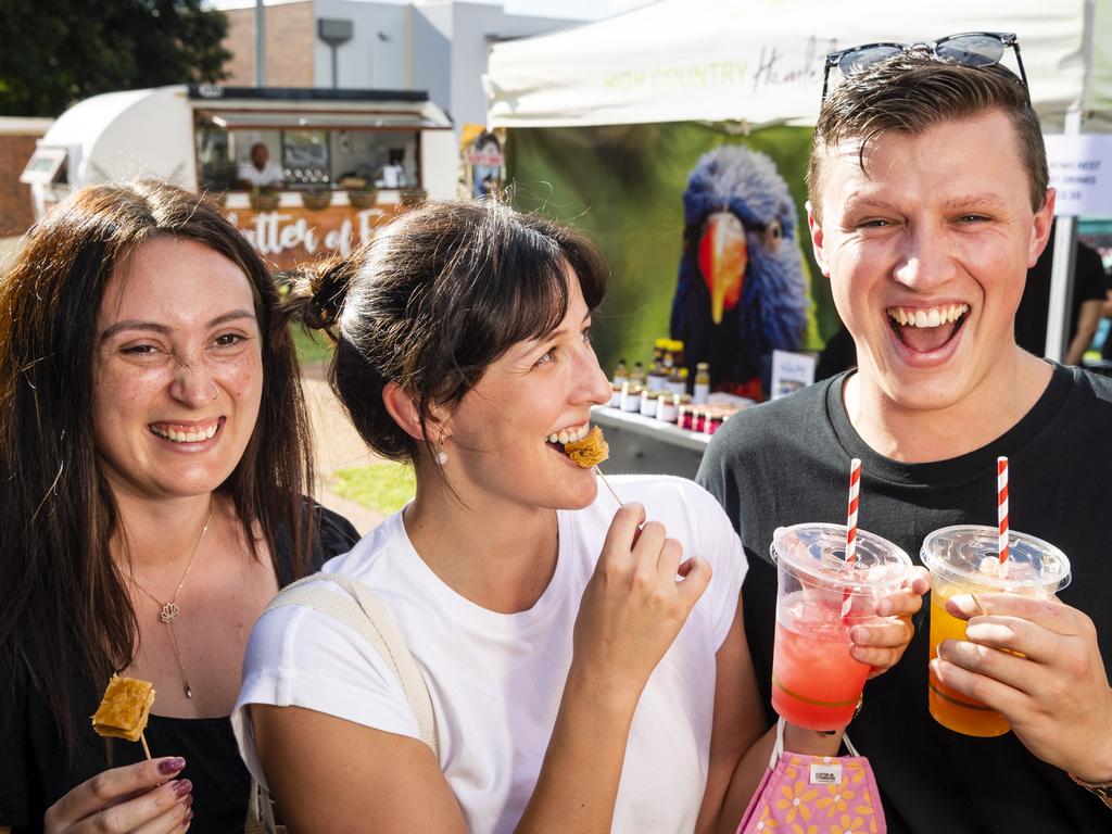 Sampling some of Melek's Baklava and More produce are (from left) Georgia Smith, Maddi Cross and Ben Brunner at Locals 4 Locals summer edition on the lawn of Empire Theatres, Friday, February 18, 2022. Picture: Kevin Farmer