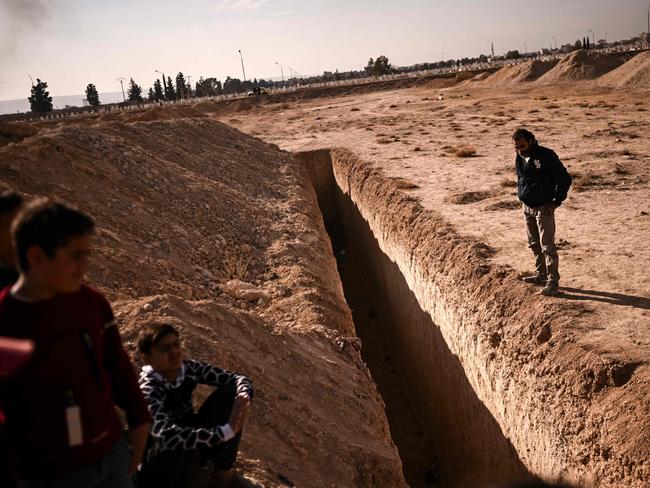 Another of the trenches which is believed to be a mass grave. Picture: AFP