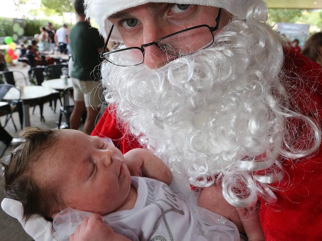 Gold Coast Private Hospital, during Baby's First Christmas' with Santa reunion.santa with 3 week old Georgia Bowman of Coomera. Pic Mike Batterham