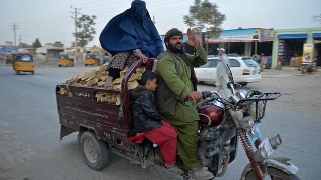 An Afghan family drives through Kunduz. Picture: AFP