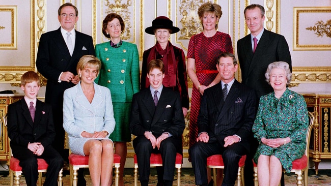 The Royal Family in the White drawing room of Windsor Castle, on the day of Prince William's Confirmation.  (L/R front) Prince Harry, Diana, Princess of Wales, Prince William, The Prince of Wales and The Queen. (L/R back) King Constantine, Lady Susan Hussey, Princess Alexandra, the Duchess of Westminster and Lord Romsey. Photo via Getty Images.